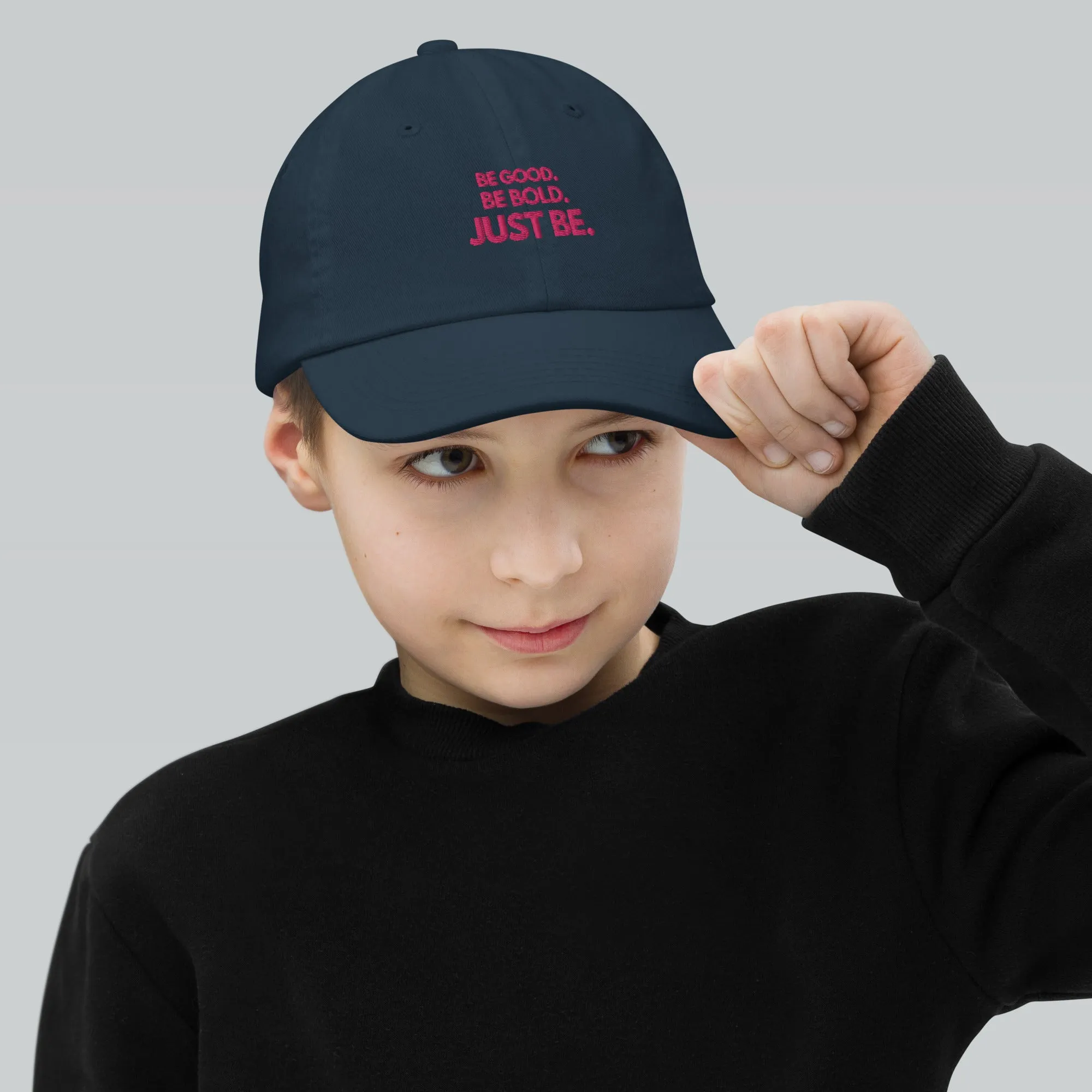 Youth Baseball Cap with Flamingo-Colored Embroidered Slogan: BE GOOD. BE BOLD. JUST BE.